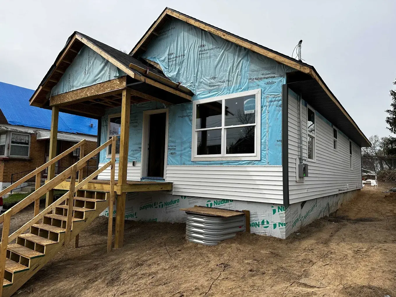 ADU mid-construction with house wrap and siding install in Lake Stevens