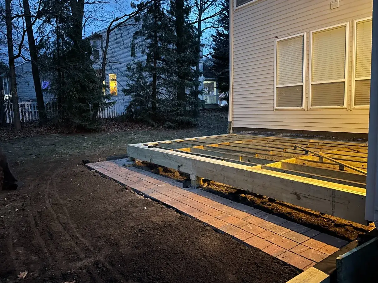 Team member working beside a reinforced wall opening