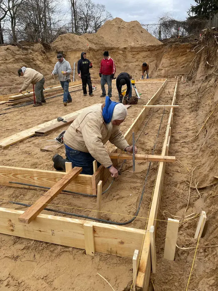 Custom retaining wall and site work on a sloped Seattle property
