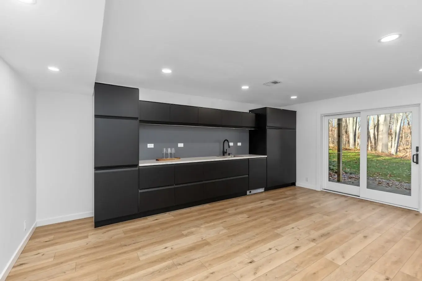 Exterior home remodel work around a window and siding