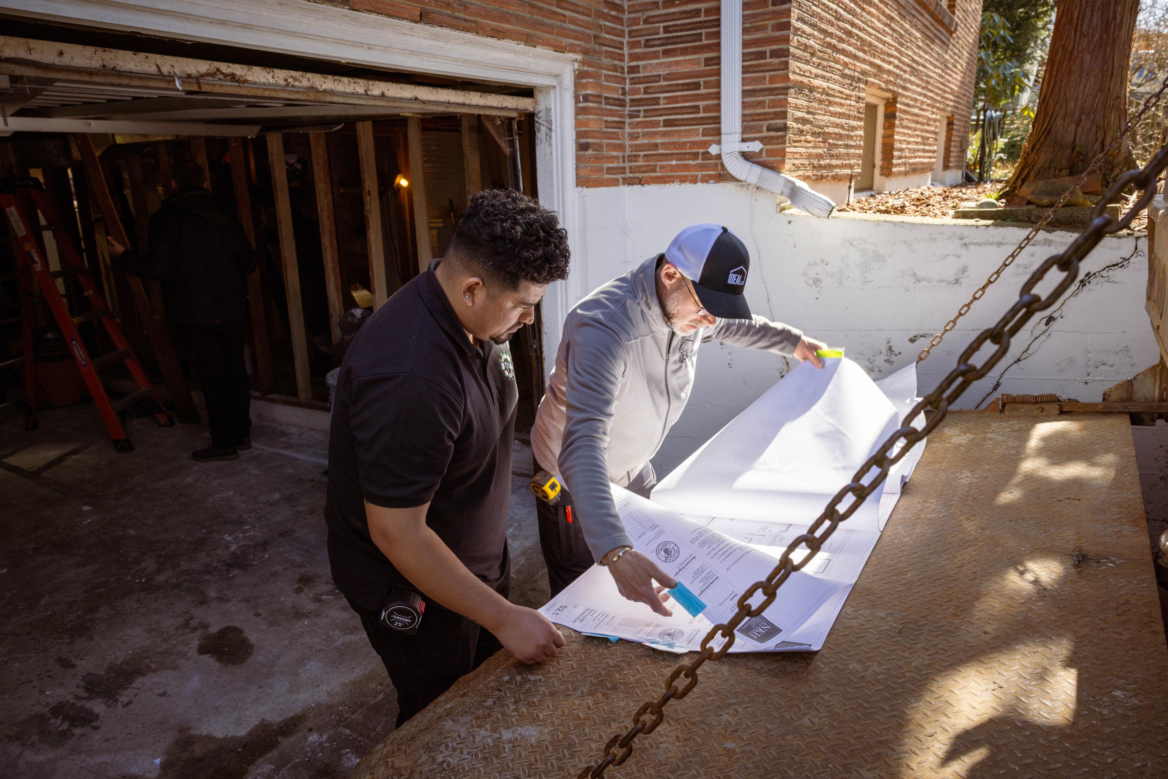 Open-plan kitchen and living area during a home remodel